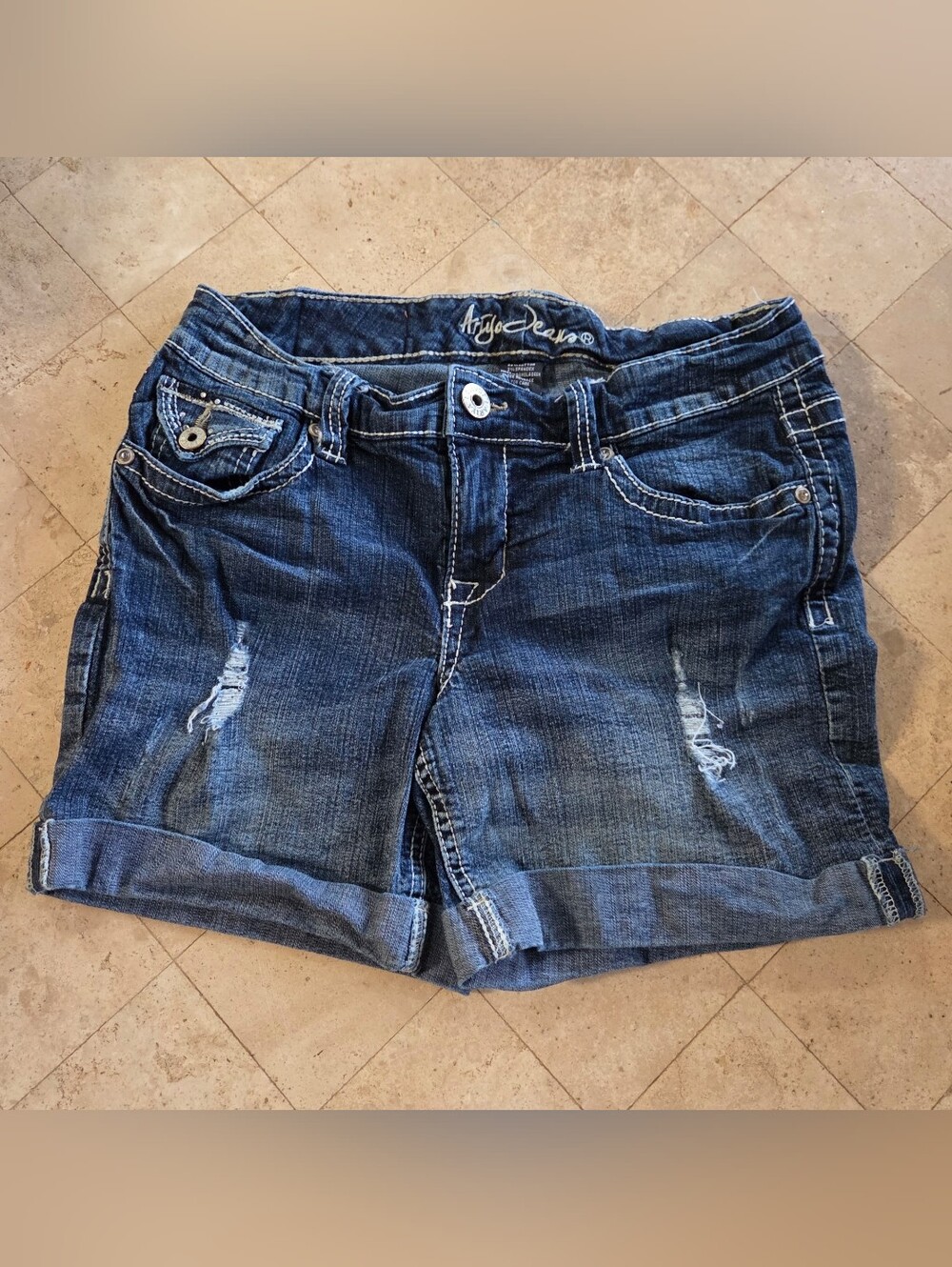 Ariya Distressed Indigo Denim Cuffed Shorts